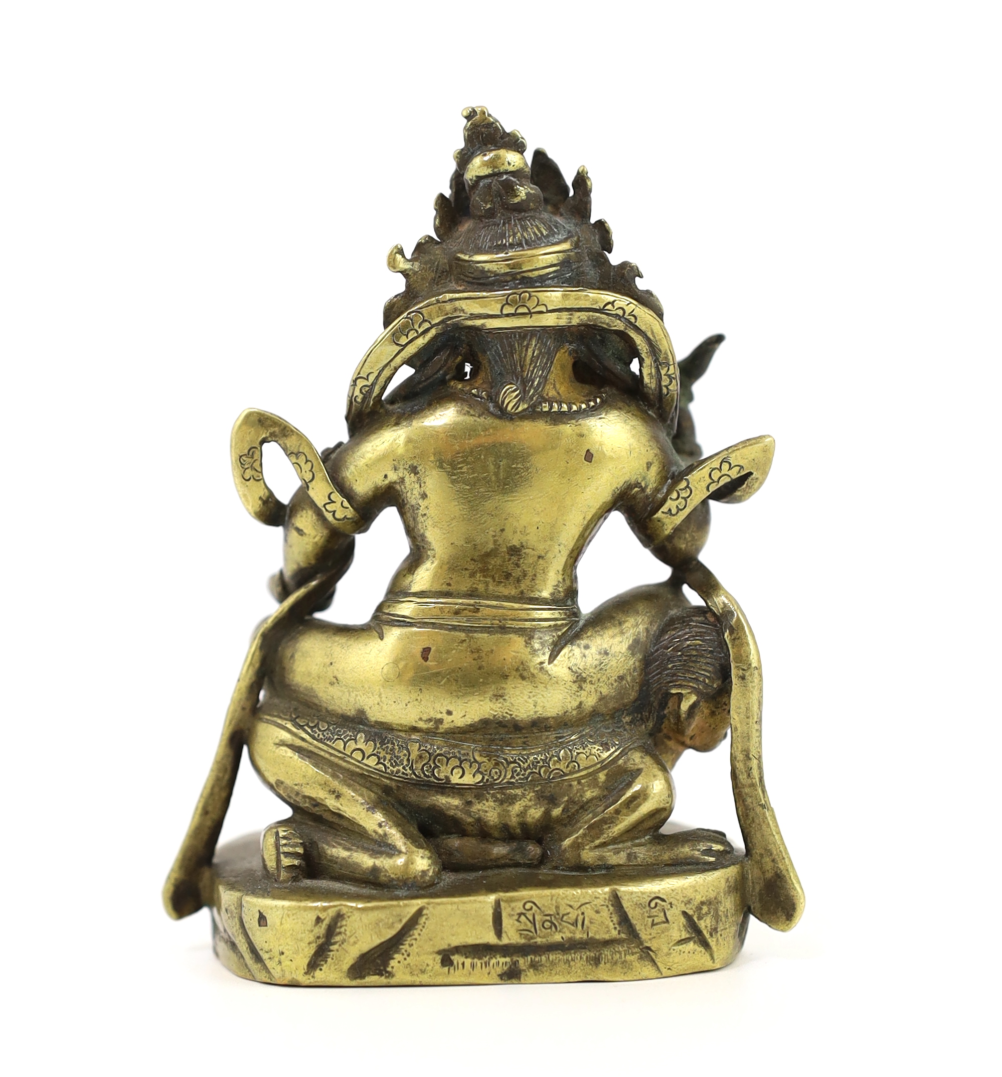 A Tibetan gilt bronze figure of a deity, 17th century